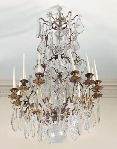 null Chandelier with twelve lights in gilded bronze and moulded-cut crystal with...