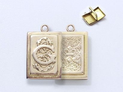 Pendant in 750-thousandths gold holding a...
