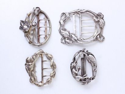 null Set of 4 belt buckles in silver 800 thousandths, three with Art Nouveau style...