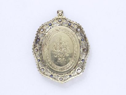  750 gold and 800 silver pendant decorated with a miniature representing a woman...