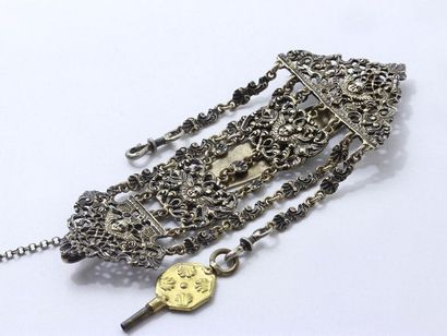 null Vermilion silver castelaine hook finely guilloché, decorated with winged cherubs'...