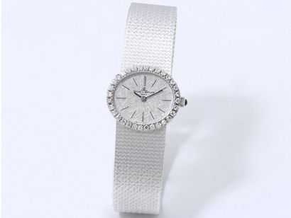 null BALSAM & MERCIER. Ladies' wristwatch in 750 thousandths white gold, oval shape,...
