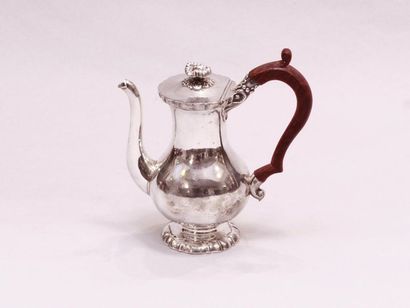 null Selfish silver teapot. By Odiot, Paris, 20th century. Plain baluster on a fluted...