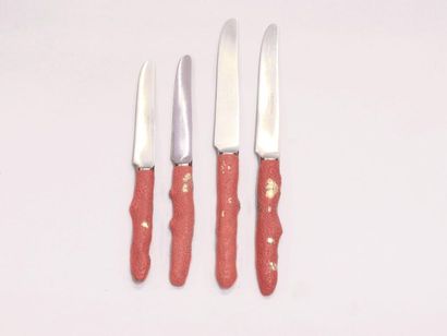 null Set of knives. France, 20th century. The handles in imitation of coral, including...