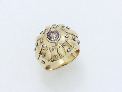 null Dome ring in 750 gold and 850 thousandths platinum centered on a brown diamond...
