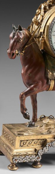 null Clock in chased bronze, gilded and painted natural in the form of a horse supporting...