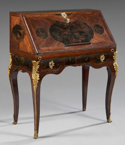 null Slope secretary inlaid with amaranth quartefeuille in wire frames of the same...