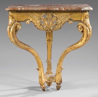 null Carved and gilded wooden console; the belt centered on a palmette; sinuous feet...