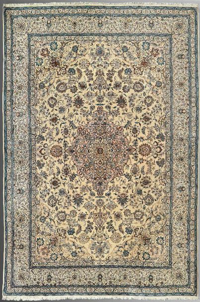null Carpet with central medallion decoration, stylized plant elements on a light...