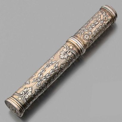 null Cylindrical wax case in silver 800 thousandths, decorated with friezes of laurel...