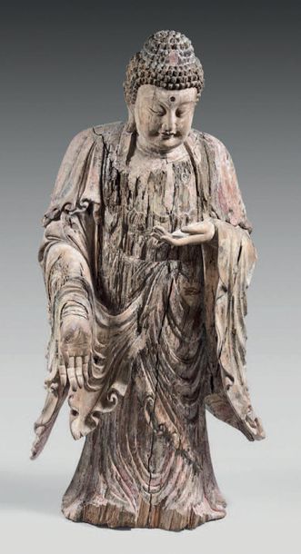CHINE Statue out of carved wooden of Buddha standing the left hand in dhyana mudra,...