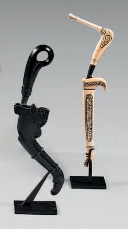 null Two daggers known as "kanjar", one the scabbard and the handle in black hard...