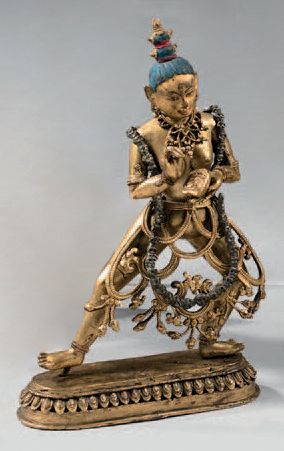 TIBET Statuette in gilt bronze and polychrome of yidam with three eyes standing in...