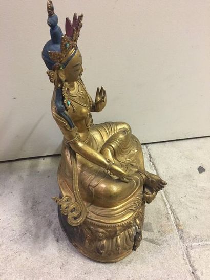 TIBET Statuette in gilded copper, of tara sitting in rajalilasana on the double lotus,...