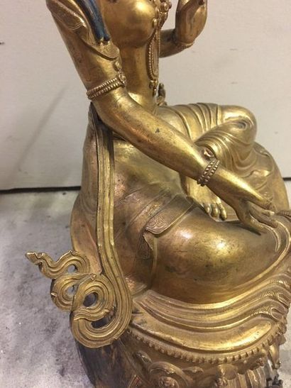 TIBET Statuette in gilded copper, of tara sitting in rajalilasana on the double lotus,...