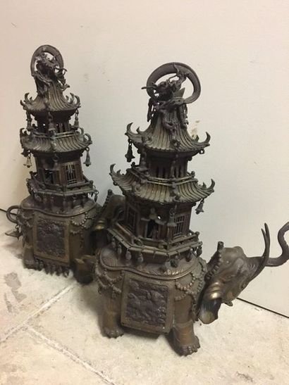 JAPON Two bronze perfume burners with a brown elephant patina standing with a pagoda...