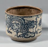 VIETNAM, four de Bat Trang 
Cylindrical ceramic pot with a beige background decorated...