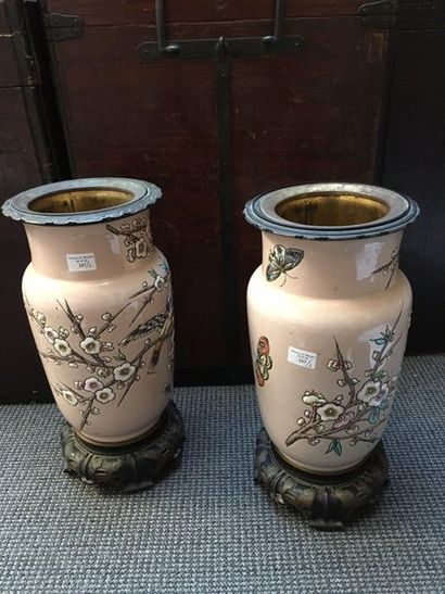France Pair of cylindrical vases with narrow necks in ceramic with pink background,...
