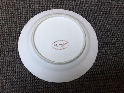 PARIS (Dagoty et Honoré) 
Three porcelain plates with polychrome decoration in the...