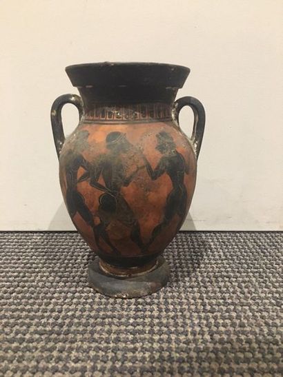 null Small black-figure amphora decorated on one side with three naked ephebes and...