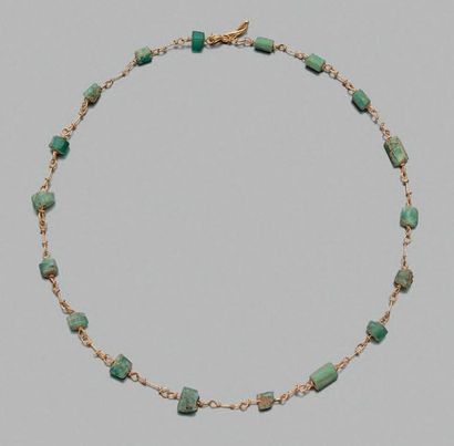 null Yellow gold children's necklace made of eighteen emerald beads.
Europe, Roman...