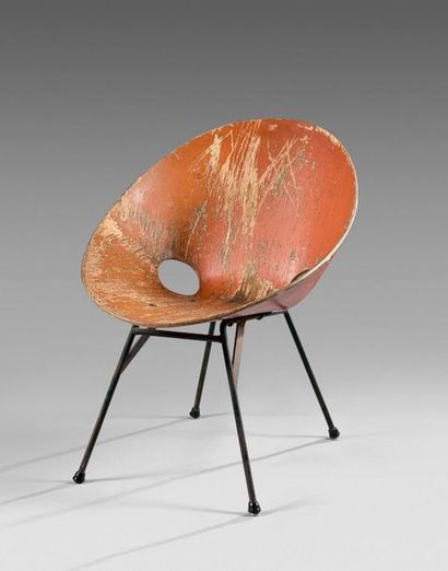 null ANONYMOUS

Armchair, circa 1980-1990

Termoformed wood and lacquered metal....