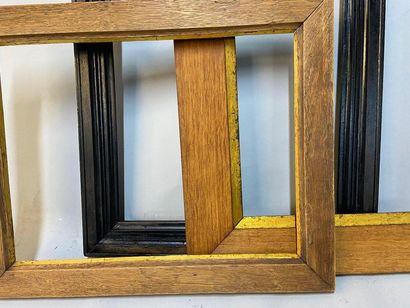 null Three moulded wooden frames, one of which is blackened.

51.5 x 35.5 x 5.5 cm...