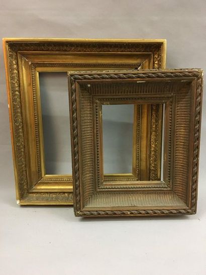 null *Two frames in wood and gilded paste, one decorated with palmette, the other...