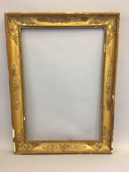 null * Wooden frame and golden paste.

Restoration period, 19th century.

(Accidents).

65...