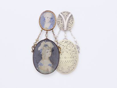 null Ravissant pendentif en or 750 millièmes orné de deux portraits miniatures ovales...