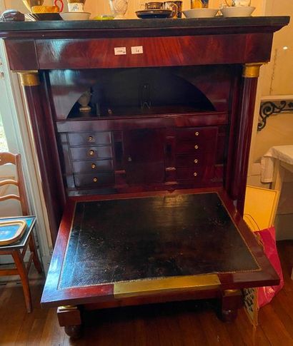 null Secretary made of wood and wood veneer opening with one flap and two leaves.

Restoration,...