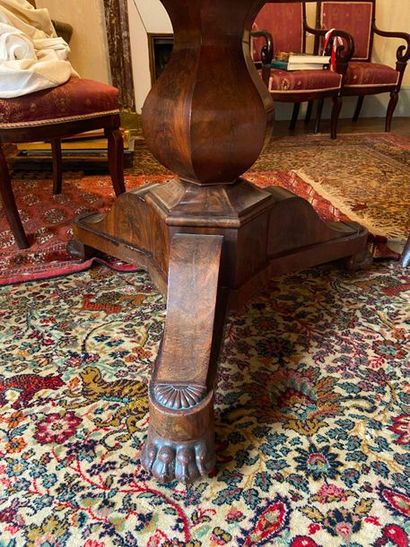 null Tripod pedestal table made of wood and wood veneer, claw base

Mid-19th century

75...