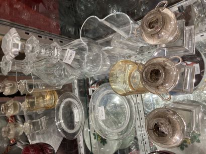null 
Three glass candleholders and a few mismatched pieces of glassware (accidents,...
