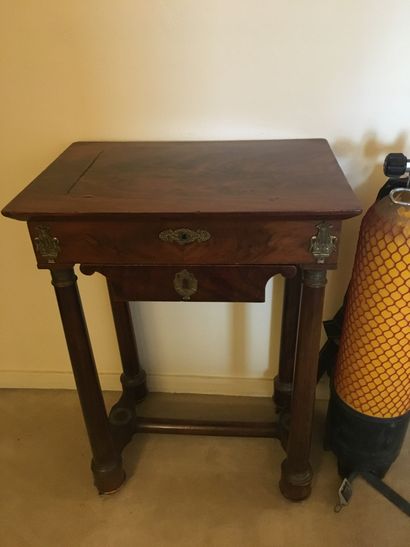  Small console in mahogany veneer, column...