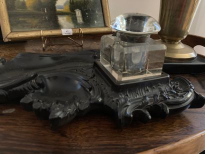  A blackened wooden inkwell (Length 26 cm) and a golden lamp (H: 28 cm) Lot sold...