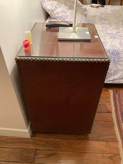  Two studded leather-look bedside tables opening by two drawers 
H: 66 - W: 50 -...