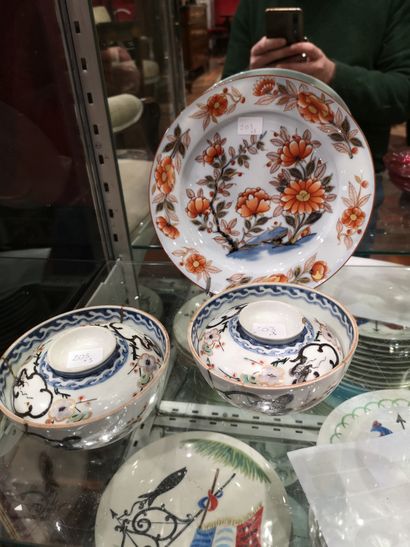  A porcelain plate and two bowls covered...
