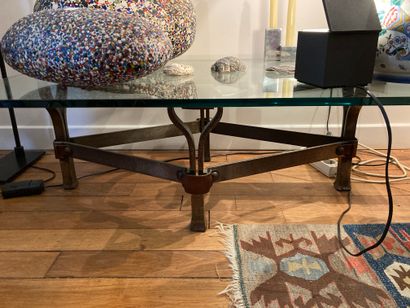  Steel and leather coffee table, glass slab...