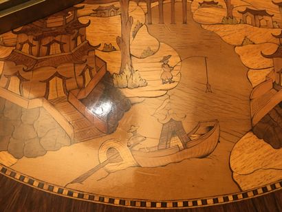 null 
Drum table, marquetry decoration of a landscape with boats, opening by a leaf;...
