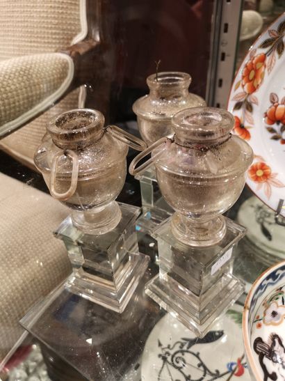 null 
Three glass candleholders and a few mismatched pieces of glassware (accidents,...