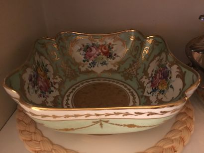 null 
Ceramics set: porcelain plates, bowls, dessert plates with flower print, vases,...