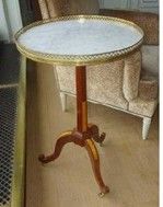 null 
GUERIDON In mahogany and espenille veneer, the marble top is encircled by an...