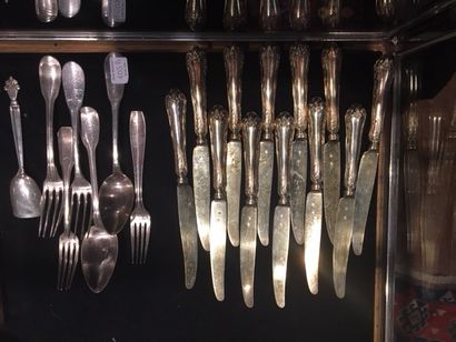  Set including 12 vermeil knives, three forks and one spoon, one cutlery and one...