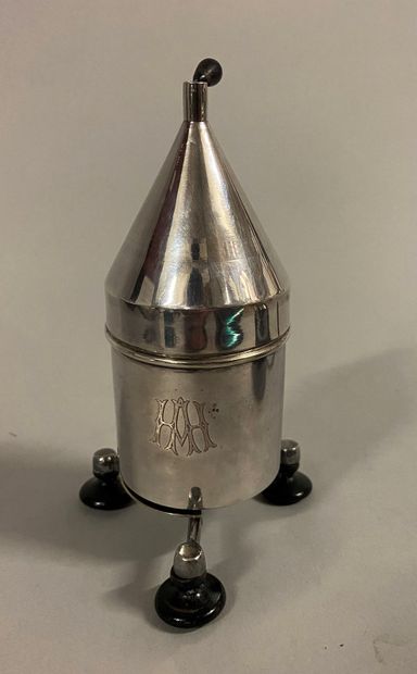 null Silver tripod pepper pot, cone-shaped lid, blackened wooden legs. 

Monogram...