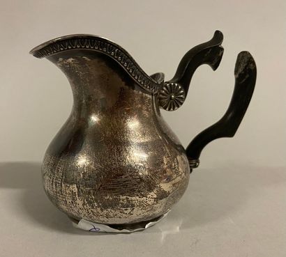 null 
Small silver milk jug, frieze of eggs. Minerva punch. 




(Crash handle and...