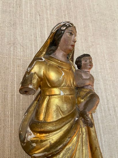 null Groupe en bois sculpté, laqué et doré 

Vierge à l'enfant 

(accidents et manques)...