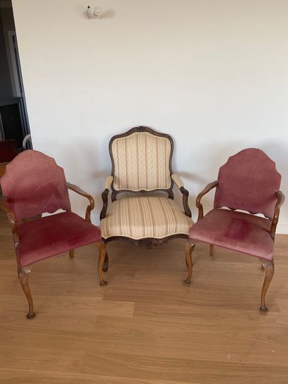 null Pair of armchairs in natural wood with sabre backrest and red velvet upholstery...