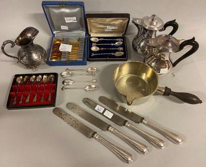 null 
Silver plated metal set including a milk jug, ERCUIS. H: 14 cm 




Set of...