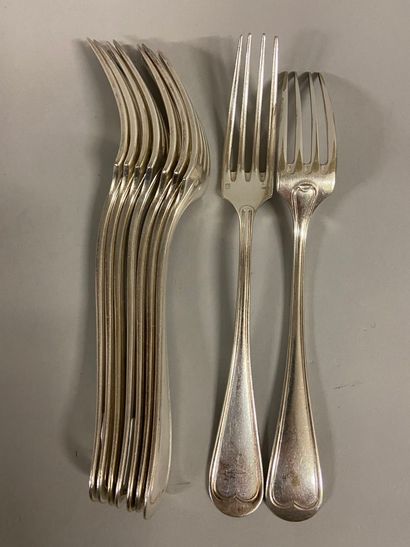 null 
Silver plated metal set including 9 forks and 10 table spoons, net model. Goldsmith...
