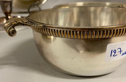 null 
Silver-plated metal set comprising a winged soufflé dish. (Heavy wear, shock)....